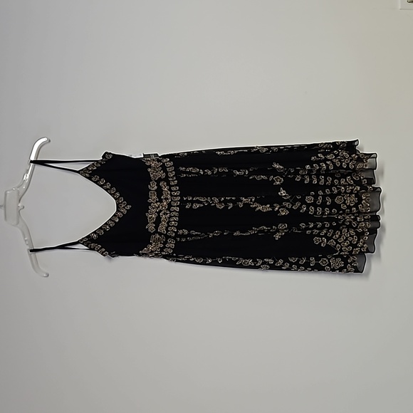 Adrianna Papell Dresses & Skirts - Adrianna Papell size 12. Adjustable straps. Beautiful gold beading all over